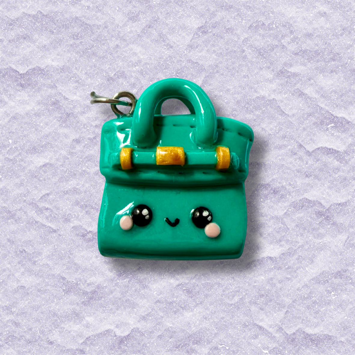 Cute luxury handbag-inspired charm